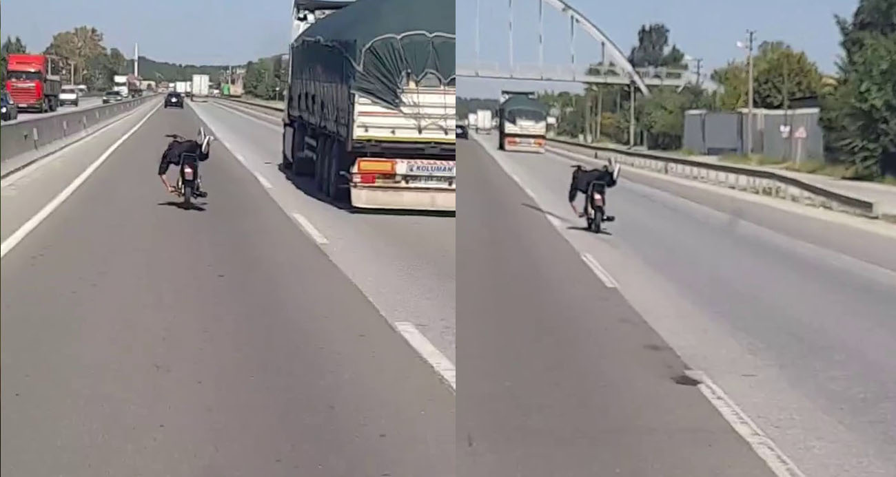 Trafik magandasının tehlikeli motosiklet yolcuğu kamerada